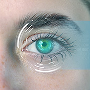 close up of a human eye with bright green iris and intricate eyelashes surrounded by circular data graphics representing technology and vision related to 6 digital advancements in ocular analysis